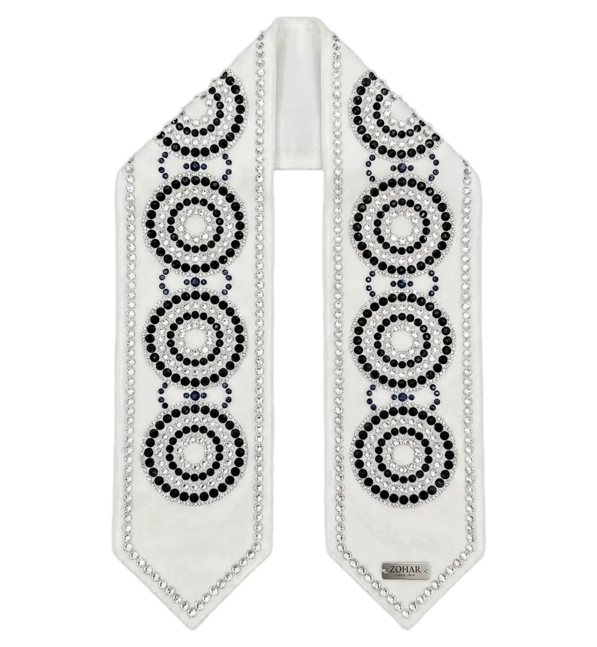 A white ZOHAR atarah with a circle pattern of clear, black and blue crystals
